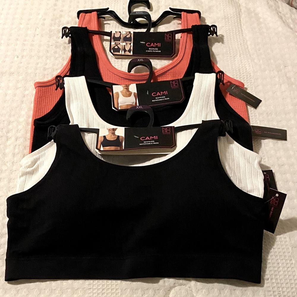 No Boundaries Sports Bras in Black, White, and Coral